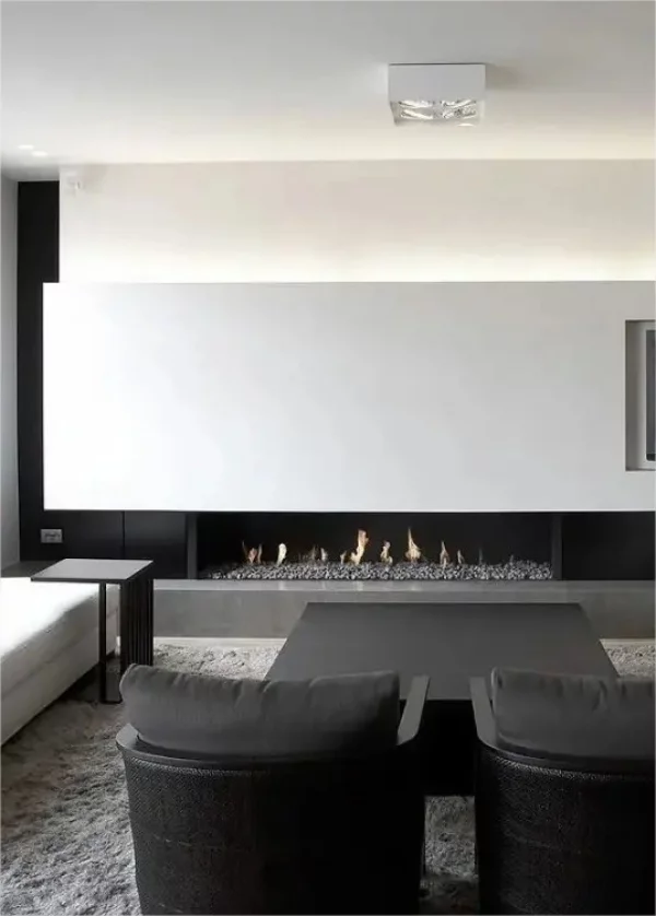 Minimalistischer Kamin minimalistisches Raumdesign Schwarz Weiss unschlagbares Farbduo