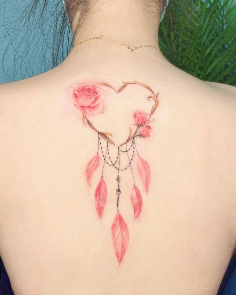 traumfaenger tattoo herz rosa federn
