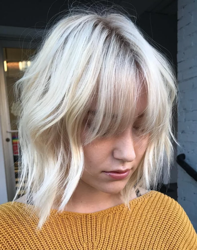 wispy bangs mittellanges haar wellig chic