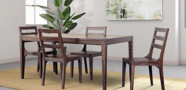 immergrüne Zimmerpflanze und Wandbild im Esszimmer